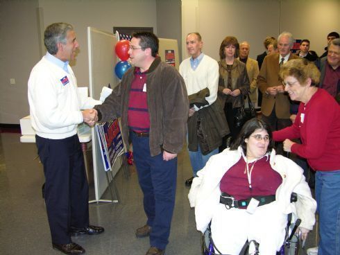 Chris greets rally guests as they come join in on the festivities.