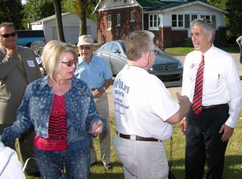 Chris greets supporters as they arrive for the Kickoff Event at Garfield Park in Aurora.