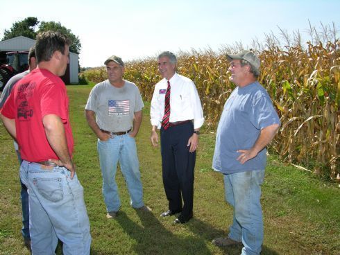 In Plano, listening in a small group of local agriculture experts while touring the 14th Congressional District.